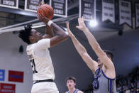 St. Bonaventure forward Osun Osunniyi (21) shoots as Northern Iowa forward Austin Phyfe (50) guards him during the first half of an NCAA college basketball game, Saturday, Nov. 27, 2021, in Olean, N.Y. (AP Photo/Bryan Bennett)