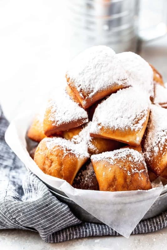 <p>Grandbaby Cakes</p><p>These New Orleans Beignets are the Real Deal! Heavenly morsels of dough are deep fried to golden brown perfection and topped with powdered sugar making you feel like you stepped off the plane into NOLA!</p><p><strong>Get the recipe: <a href="https://grandbaby-cakes.com/new-orleans-beignets/" rel="nofollow noopener" target="_blank" data-ylk="slk:New Orleans Beignets;elm:context_link;itc:0;sec:content-canvas" class="link ">New Orleans Beignets</a></strong></p>