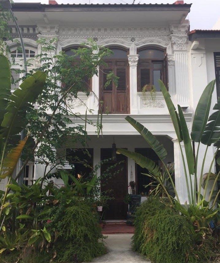 A photo of the exterior of the shophouse when the couple bought it.