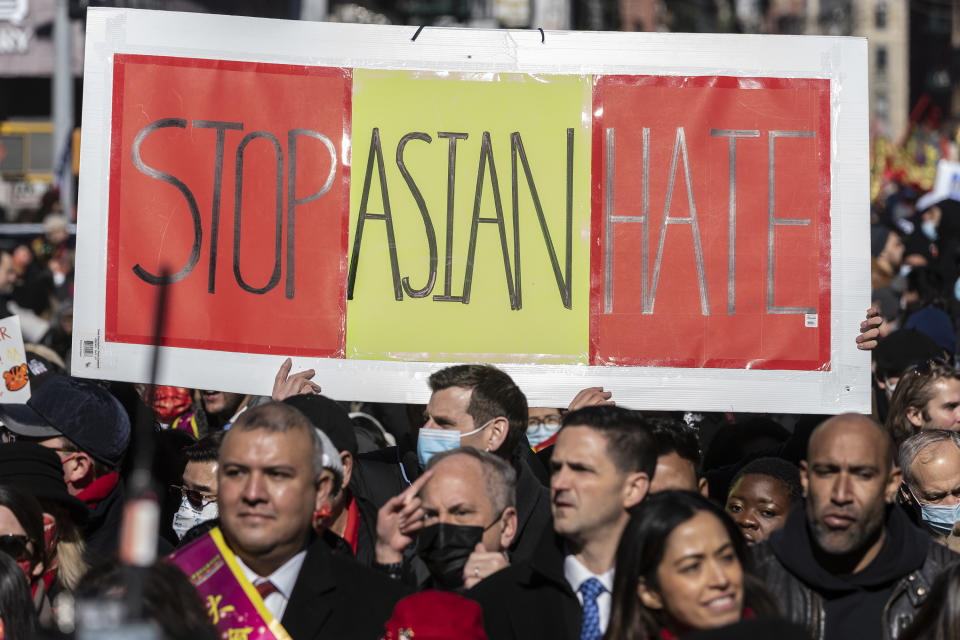 A banner at the Lunar New Year parade in Manhattan’s Chinatown reads “Stop Asian hate.” 