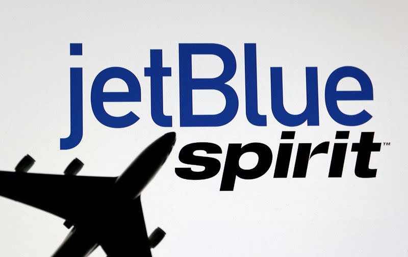 FILE PHOTO: Illustration shows Spirit Airlines and jetBlue Airways logos