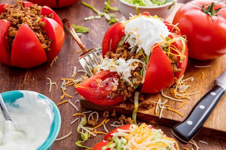 <p>We're all for a genius low-carb hack — and these tomatoes totally deliver. </p><p>Get the <a href="https://www.delish.com/uk/cooking/recipes/a30053026/taco-tomatoes-recipe/" rel="nofollow noopener" target="_blank" data-ylk="slk:Taco Tomatoes;elm:context_link;itc:0;sec:content-canvas" class="link ">Taco Tomatoes</a> recipe. </p>