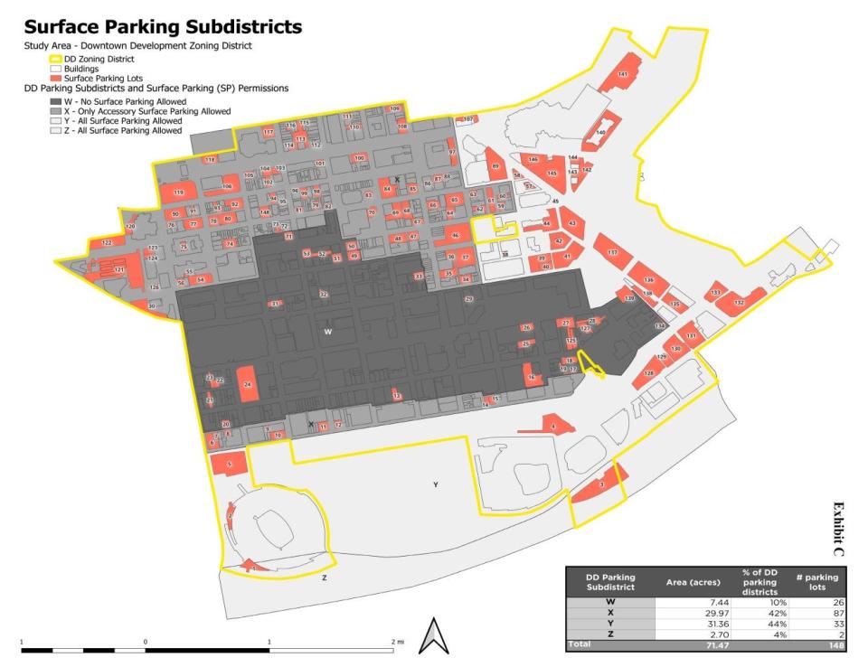 Within the Downtown Development Zoning District, new parking lots are already banned within the gray shown here. The zoning code amendment would further prohibit new lots outside this area.