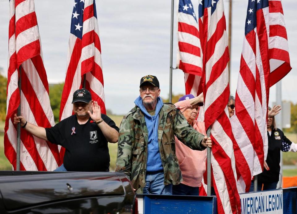 Members of American Legion Post 626 ride in the 2023 Tarrant County Veterans Day Parade.