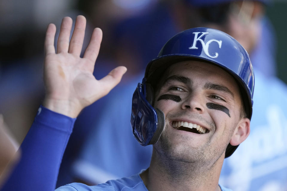 Kansas City Royals' Michael Massey celebrates in the dugout after scoring on a single by Drew Waters during the second inning of a baseball game against the Chicago White Sox Monday, Sept. 4, 2023, in Kansas City, Mo. (AP Photo/Charlie Riedel)