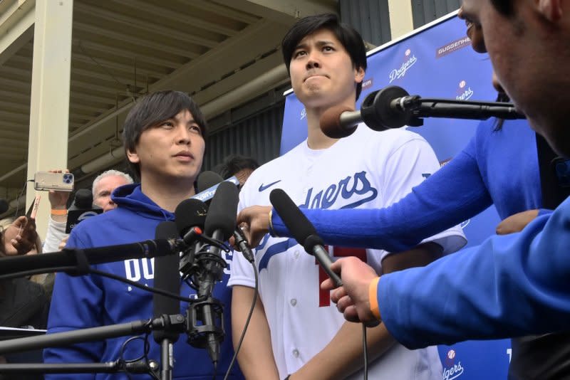 Shohei Ohtani's longtime interpreter, Ippei Mizuhara (L), was fired Wednesday by the Los Angeles Dodgers. File Photo by Jim Ruymen/UPI