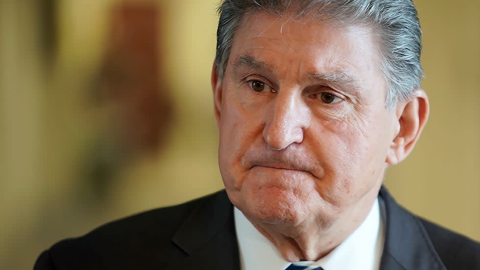 Sen. Joe Manchin (D-W.Va.) addresses reporters to discuss Covid-19 on Tuesday, January 4, 2022. He also took questions regarding Build Back Better and other legislative issues.