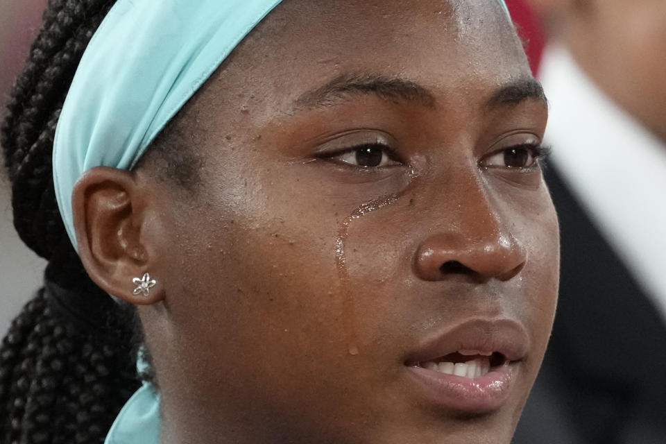 Coco Gauff of the U.S. cries after losing to Poland's Iga Swiatek in the women final match of the French Open tennis tournament at the Roland Garros stadium Saturday, June 4, 2022 in Paris. Swiatek won 6-1, 6-3. (AP Photo/Christophe Ena)