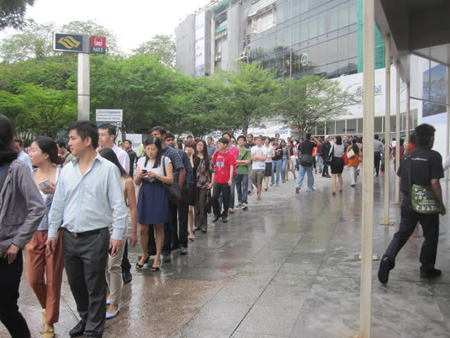 Four queues that led to free bus bridging services were set up for commuters outside Plaza Singapura at Dhoby Ghaut station. (Yahoo! photo/Jeanette Tan)