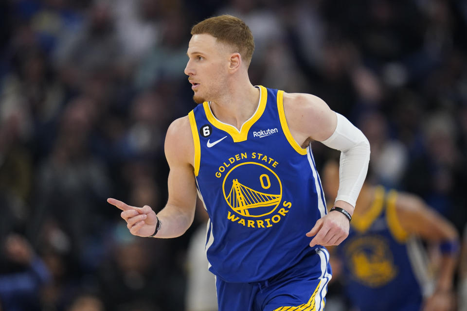 Golden State Warriors forward Donte DiVincenzo reacts after scoring against the Houston Rockets during the first half of an NBA basketball game in San Francisco, Friday, Feb. 24, 2023. (AP Photo/Godofredo A. Vásquez)