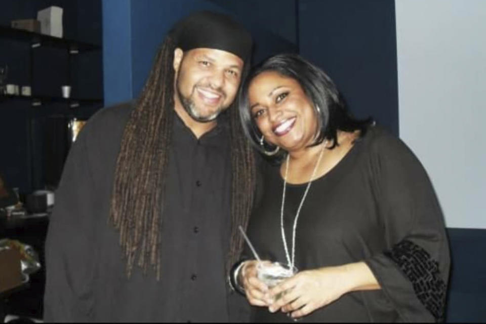 This photo, date and location not known, provided by the Barksdale family shows Laneeka Barksdale, right, with her brother, Omari Barksdale. The siblings were close, according to her brother, who said his 47-year-old sister was a fierce protector of her family. She died March 23, 2020, of COVID-19 complications. (Barksdale Family via AP)