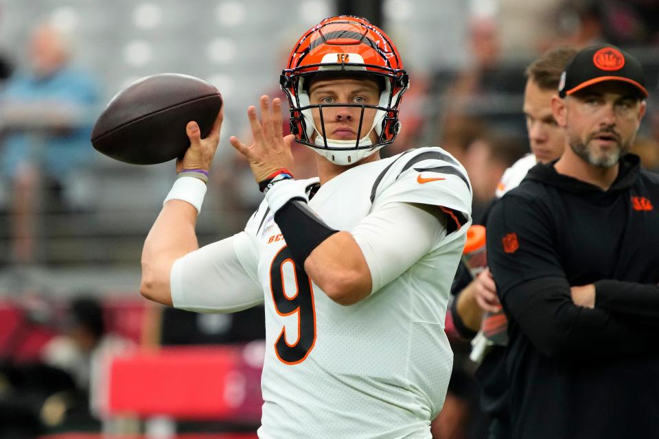 Cincinnati Bengals quarterback Joe Burrow (9) warms up prior to an NFL football game against the Arizona Cardinals, Sunday, Oct. 8, 2023, in Glendale, Ariz.