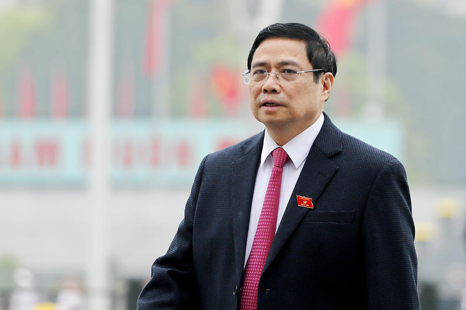 Pham Minh Chinh, a member of the Communist party's central committee for personnel and organization, enters the hall of the National Assembly in Hanoi, Vietnam on March 24, 2021. Vietnam's legislature voted Monday, April 5, 2021, to make Pham Minh Chinh the country's next prime minister. Outgoing Prime Minister Nguyen Xuan Phuc was appointed the new president. (AP Photo/Minh Hoang)