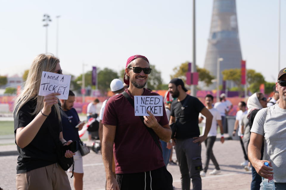 Fans holding a sign 'I Need A Ticket' in Qatar, during the FIFA World Cup 2022. Picture date: Monday November 21, 2022. (Photo by Peter Byrne/PA Images via Getty Images)