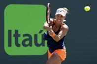 Mar 26, 2017; Miami, FL, USA; Angelique Kerber of Germany hits a backhand against Shelby Rogers of the United States (not pictured) on day six of the 2017 Miami Open at Crandon Park Tennis Center. Kerber won 6-4, 7-5. Mandatory Credit: Geoff Burke-USA TODAY Sports