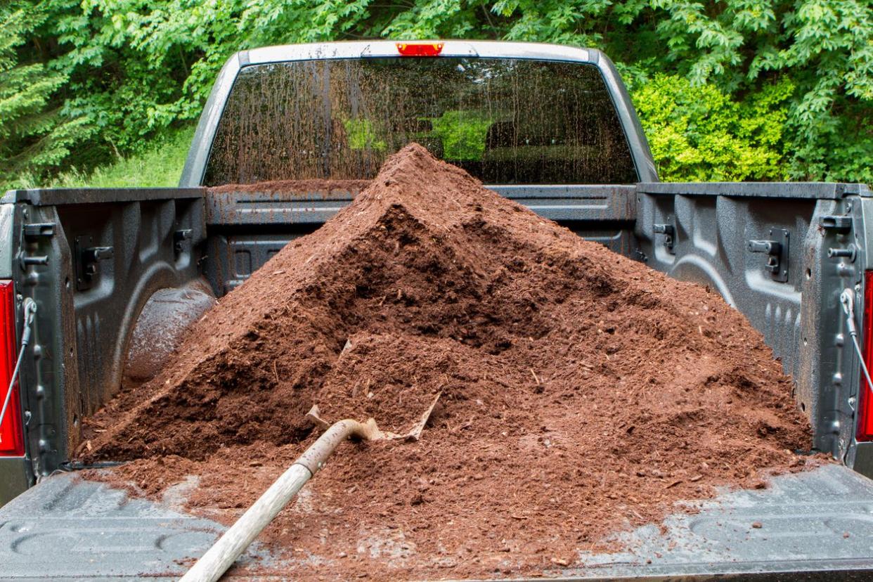 Unloading Mulch from a Pickup Truck