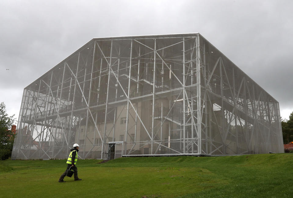 A gardener walks past the National Trust for Scotland's Box (Picture: PA)