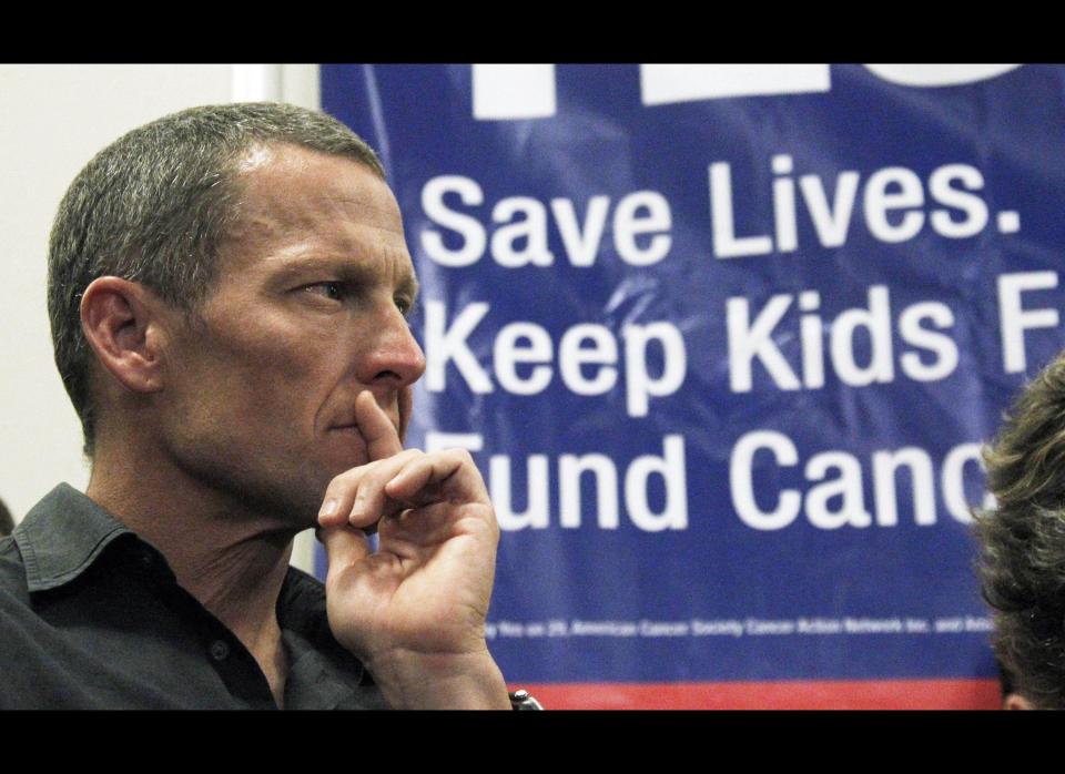 This May 11, 2012, file photo shows cycling great and cancer survivor Lance Armstrong at a rally in favor of Proposition 29, at Children's Hospital in Los Angeles.