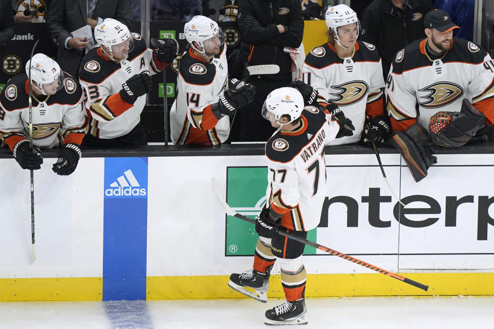 Anaheim Ducks right wing Frank Vatrano (77) is congratulated after his goal during the second period of the team's NHL hockey game against the Boston Bruins, Thursday, Oct. 20, 2022, in Boston. (AP Photo//Steven Senne)