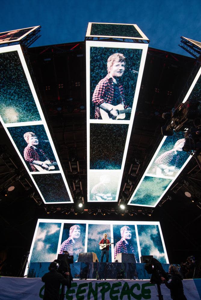 Stage effects dwarf Ed Sheeran on the Pyramid stage at Glastonbury