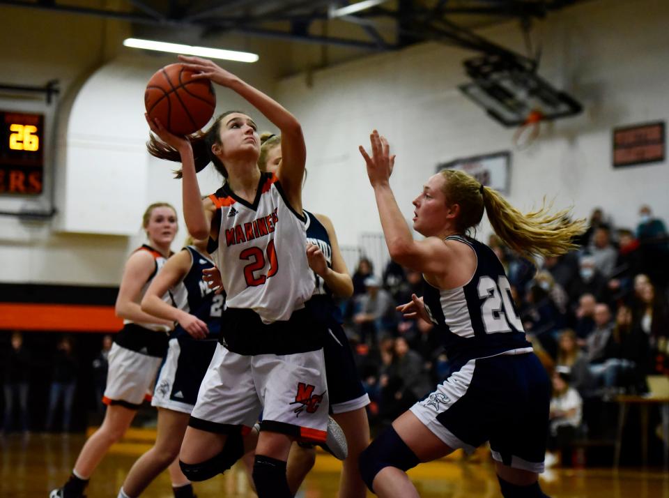 Marine City's Khloe Austin rises for a layup in a game earlier this season. The forward scored a game-high 17 points and grabbed nine rebounds in the Mariners' 55-24 win over Roseville on Friday.