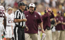 FILE - In this Saturday, Sept. 11, 2021 file photo, Texas A&M head coach Jimbo Fisher argues with a referee in the second half of an NCAA college football game against Colorado in Denver. Texas A&M plays Arkansas on Saturday, Sept. 25, 2021. (AP Photo/David Zalubowski, File)