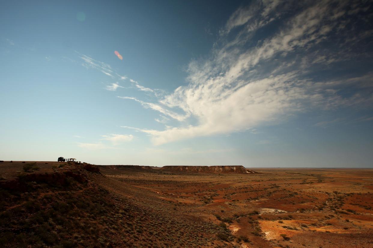 The empty harshness of the Australian Outback. Photo from Getty