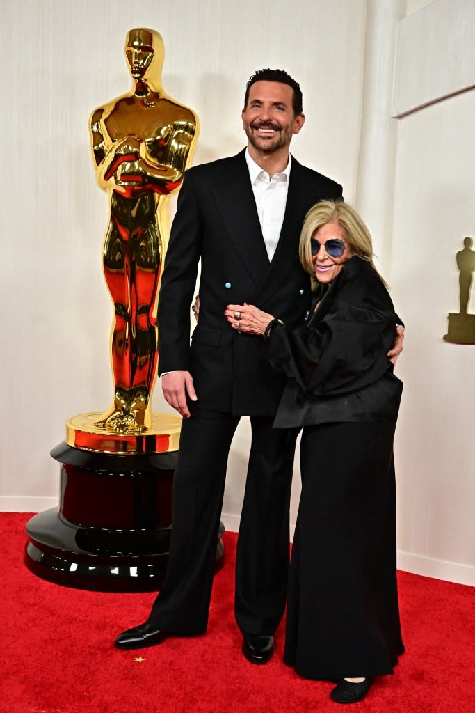 Bradley Cooper and his mother, Gloria Campano, attend the 2024 Oscars. AFP via Getty Images