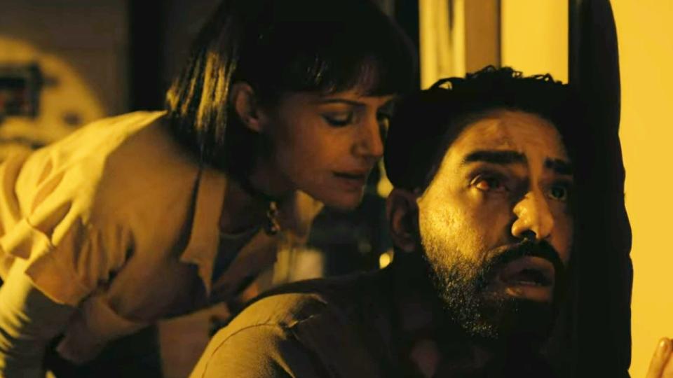 Rahul Kohli and Carla Gugino in The Fall of The House of Usher