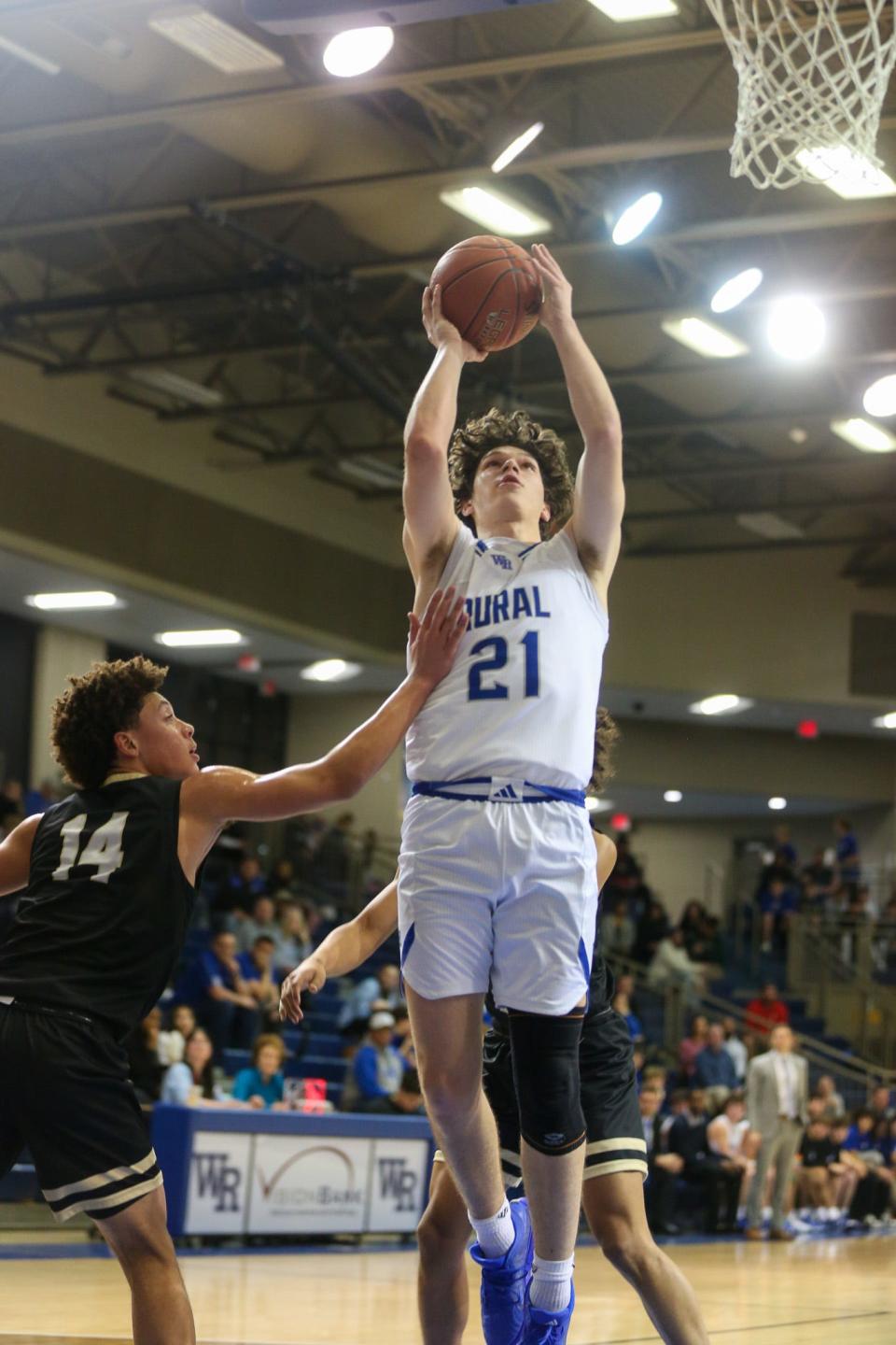 Washburn Rural's Griffin Durst shoots a layup against Topeka High on Wednesday, Jan. 10. Washburn Rural defeated Topeka High 89-65.