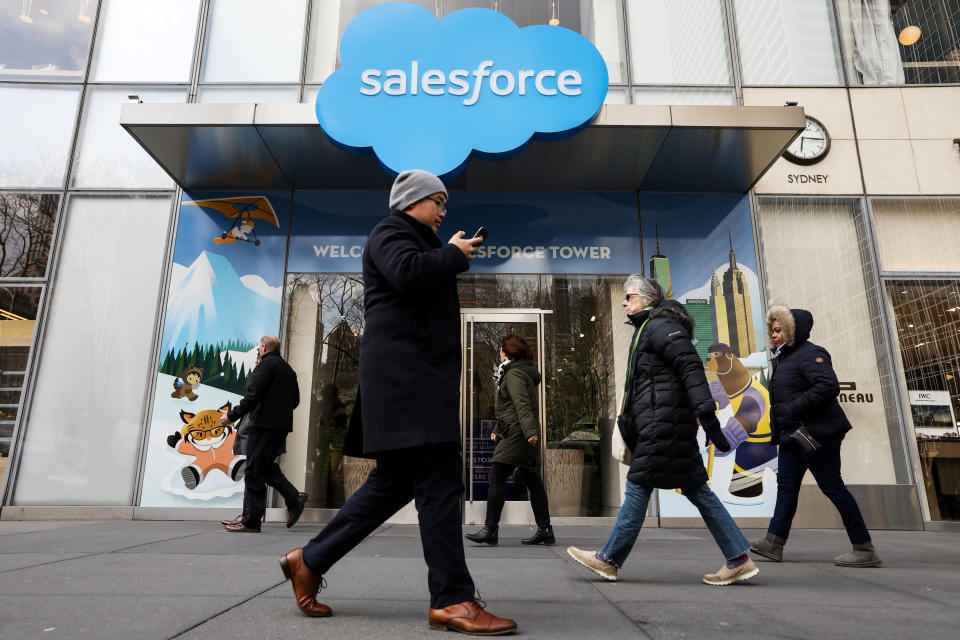 People walk past the Salesforce Tower and Salesforce.com offices in New York City, the United States, March 7, 2019. REUTERS/Brendan McDermid