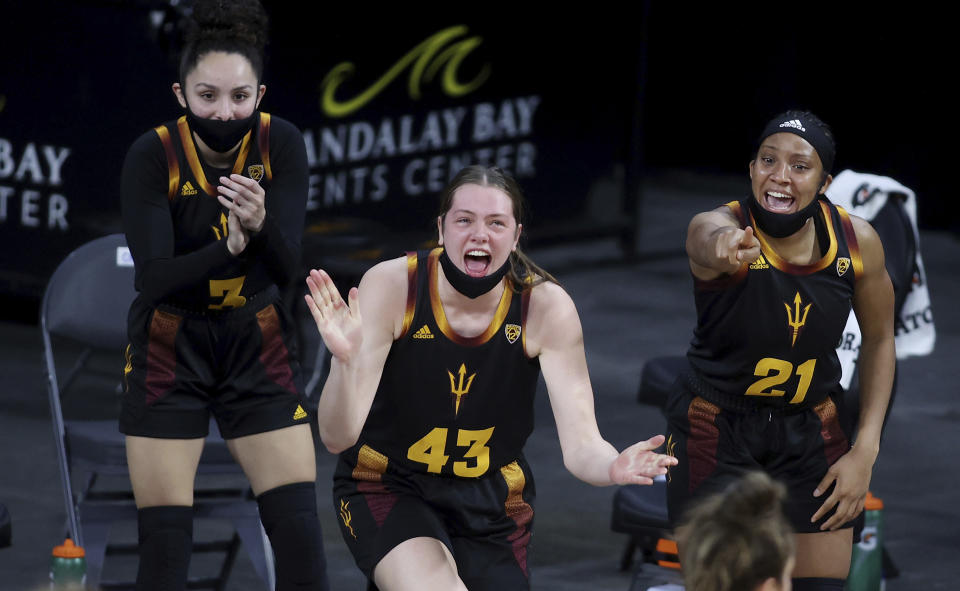 Arizona State's Gabriela Bosquez, (3) Imogen Greenslade (43) and Sydnei Caldwell (21) react after a foul call during an NCAA college basketball game against Southern California in the first round of the Pac-12 women's tournament Wednesday, March 3, 2021, in Las Vegas. (AP Photo/Isaac Brekken)