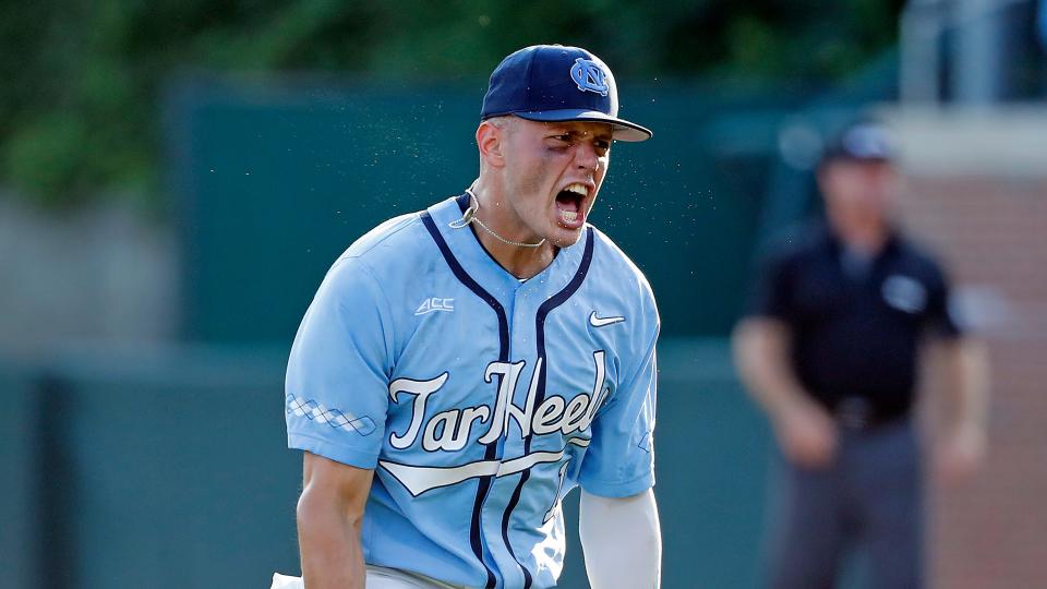 North Carolina shortstop Danny Serretti celebrates turning a double play on defense against Arkansas during the eighth inning Sunday in the second game of the NCAA Tournament super regionals at Boshamer Stadium.