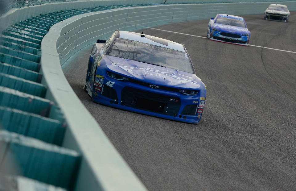 You can typically find Kyle Larson this close to the wall in the corners at an intermediate track. (Getty)