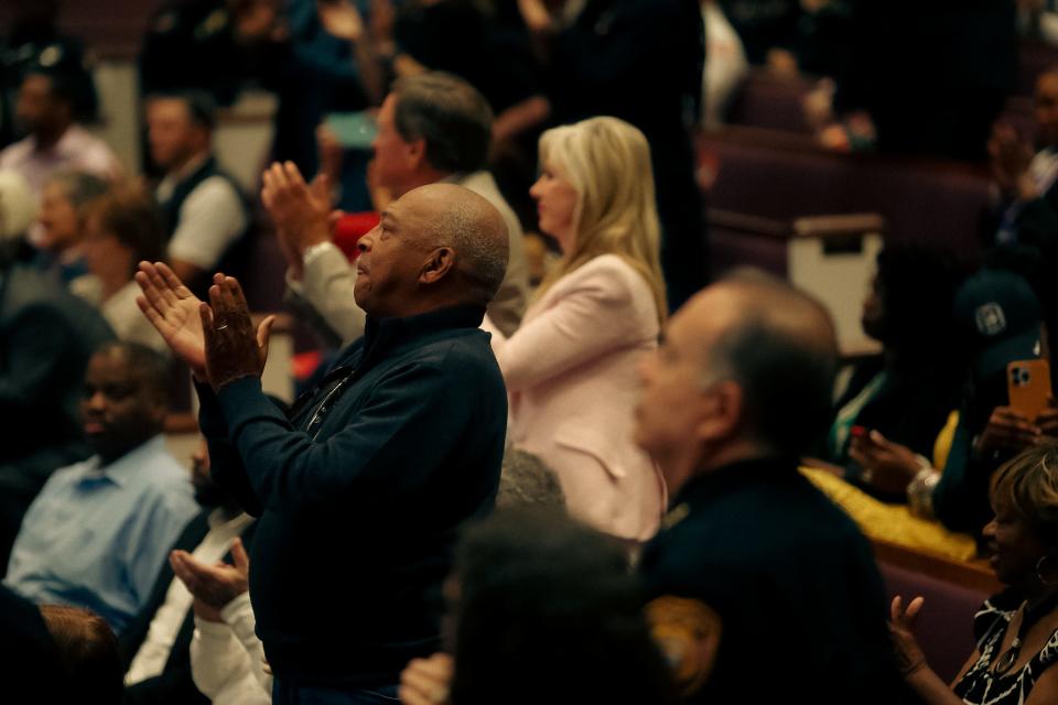 Audience members clap as Mayor Paul Young speaks about all the progress his administration has made within their first 100 days on Tuesday, April 16, 2024 at Mount Vernon Baptist Church in Memphis, Tenn.