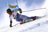 United States' River Radamus speeds down the course during an alpine ski, men's World Cup giant slalom, in Soelden, Austria, Sunday, Oct. 24, 2021. (AP Photo/Marco Trovati)