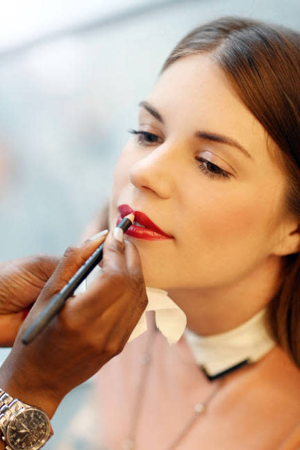 <div class="caption-credit"> Photo by: Elizabeth Griffin</div><div class="caption-title">Define</div>Uzo recommends applying lipliner after lipstick in this instance. "That way, it's softer, and you can blend the color easier." Here, she used a bright red lipstick to define and brighten the lips. <br> <b><br> More:</b> <b><br></b> <b><a rel="nofollow noopener" href="http://www.elle.com/beauty/makeup-skin-care/best-face-wash#slide-1?link=emb&dom=yah_life&src=syn&con=blog_elle&mag=elm" target="_blank" data-ylk="slk:Best 14 Face Washes Right Now;elm:context_link;itc:0;sec:content-canvas" class="link ">Best 14 Face Washes Right Now</a></b> <br> <b><a rel="nofollow noopener" href="http://www.elle.com/beauty/makeup-skin-care/naeem-khan-fall-2013-hair-and-makeup?link=emb&dom=yah_life&src=syn&con=blog_elle&mag=elm" target="_blank" data-ylk="slk:Naeem Khan's '20s Inspired Hair and Makeup;elm:context_link;itc:0;sec:content-canvas" class="link ">Naeem Khan's '20s Inspired Hair and Makeup</a></b>