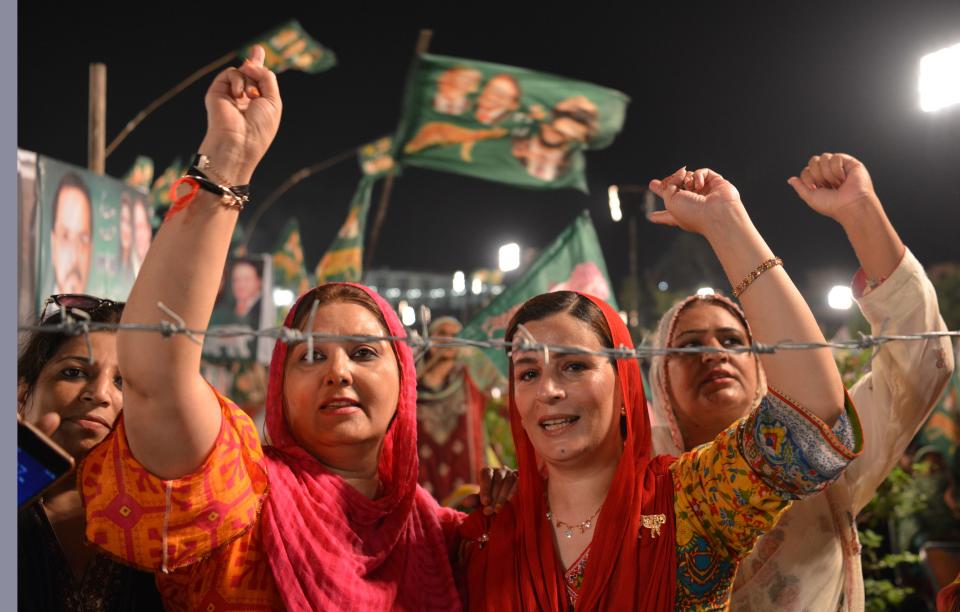 Supporters of Shahbaz Sharif, the younger brother of former Pakistani Prime Minister Nawaz Sharif and head of the Pakistan Muslim League-Nawaz (PML-N), at a campaign meeting ahead of the election in Rawalpindi on July 23, 2018.