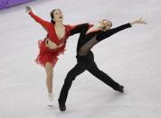 <p>Yura Min and Alexander Gamelin of South Korea perform during the ice dance short dance team event in the Gangneung Ice Arena at the 2018 Winter Olympics in Gangneung, South Korea, Sunday, Feb. 11, 2018. (AP Photo/David J. Phillip) </p>