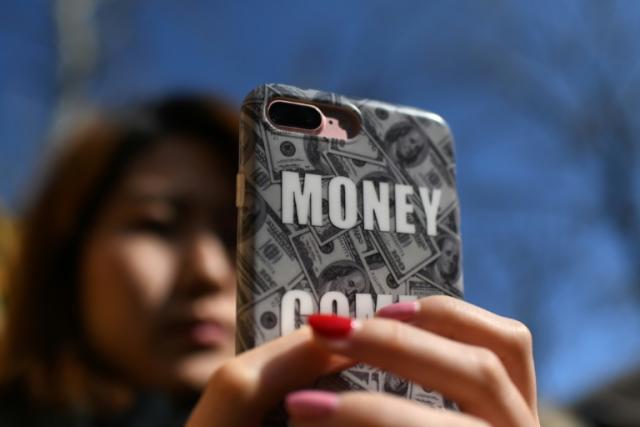 Smartphones have made it even easier for consumers to borrow cash in China and a number of online platforms have listed publicly in the US this year