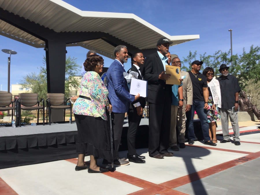 Harvey Munford towers above fellow leaders including U.S. Rep. Steven Horsford, William McCurdy II and Las Vegas Councilman Cedric Crear at his Historic Westside Legacy Park induction ceremony on Saturday, June 4, 2022. (Greg Haas / 8NewsNow)
