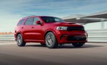 <p>The Dodge Durango is the <a href="https://www.caranddriver.com/features/g19876364/quickest-suvs-tested-ever/" rel="nofollow noopener" target="_blank" data-ylk="slk:quickest SUV on this list;elm:context_link;itc:0;sec:content-canvas" class="link ">quickest SUV on this list</a>, it tows the most, and is essentially a three-row muscle car. The Durango has three flavors of engine: a 293-hp V-6 with 6200 pounds of max towing all the way up to 475-hp V-8. Every powertrain is supported by an eight-speed automatic. Max towing with the V-8 jumps to 8700 pounds (with the Tow N Go package), meaning it tows more than any <a href="https://www.caranddriver.com/features/g30858394/best-trucks-for-maximum-towing-capacity/" rel="nofollow noopener" target="_blank" data-ylk="slk:mid-size pickup;elm:context_link;itc:0;sec:content-canvas" class="link ">mid-size pickup</a>. The Durango offers solid handling with a comfy ride. An 8.4-inch touchscreen with Apple CarPlay and Android Auto comes standard—that's larger than most optional displays on other SUVs. A 10.1-inch screen is optional. The third row is decently roomy and allows the Durango to seat seven. The V-6 Durango scored 22 mpg on our highway fuel-economy test, and the all-wheel-drive V-8 Durango managed 23 mpg, beating its EPA estimate.</p><ul><li>Base price: $34,872</li><li><em>C/D</em> rating: 7/10 </li></ul><p><a class="link " href="https://www.caranddriver.com/dodge/durango/" rel="nofollow noopener" target="_blank" data-ylk="slk:MORE ABOUT THE DURANGO;elm:context_link;itc:0;sec:content-canvas">MORE ABOUT THE DURANGO</a></p>