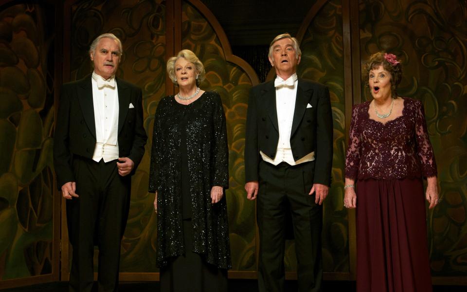 Billy Connolly, Maggie Smith, Tom Courtenay and Pauline Collins in a scene from the 2012 motion picture "Quartet."