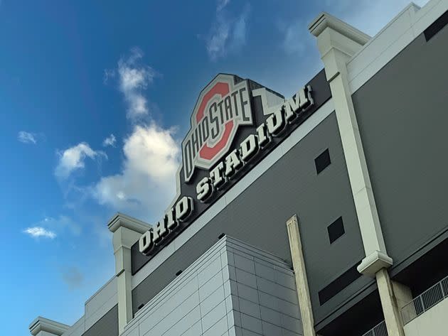 A person fell from the stands and died at Ohio Stadium in Columbus, Ohio, during a commencement ceremony on Sunday, authorities said.