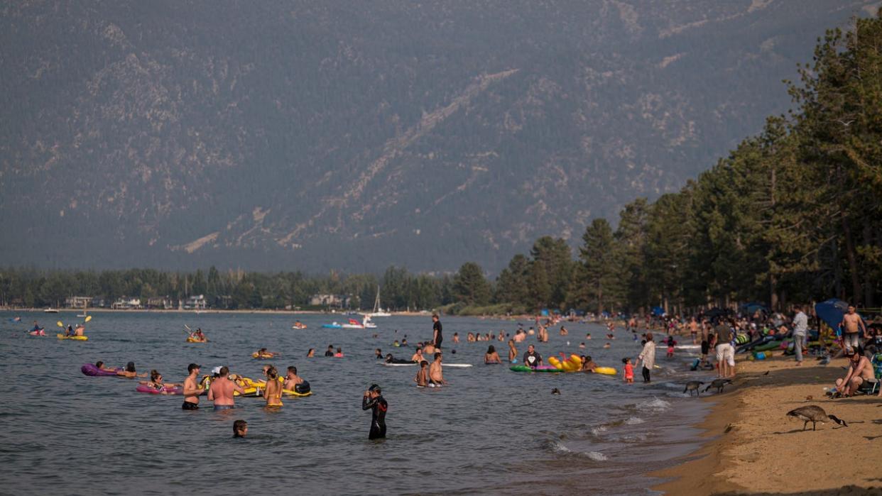 <div>People visit Pope Beach in South Lake Tahoe, California, U.S., on Friday, Sept. 4, 2020. Residents unhappy with the increase in visitors to Lake Tahoe since the Covid-19 pandemic began staged a protest as tourists streamed into the basin on Labor Day weekend. Photographer: David Paul Morris/Bloomberg via Getty Images</div>