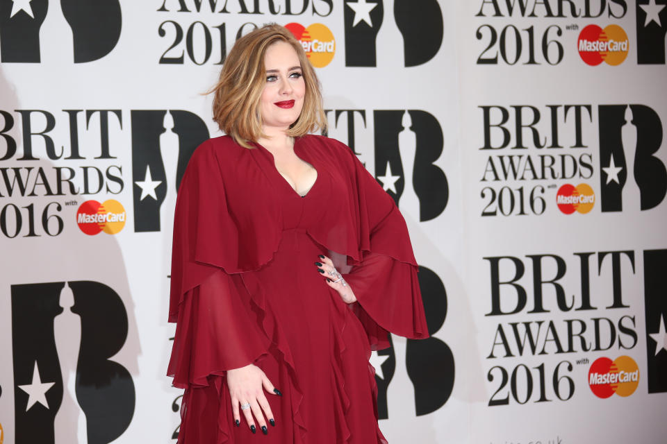 Singer Adele poses for photographers upon arrival for the Brit Awards 2016 at the 02 Arena in London, Wednesday, Feb. 24, 2016. (Photo by Joel Ryan/Invision/AP)