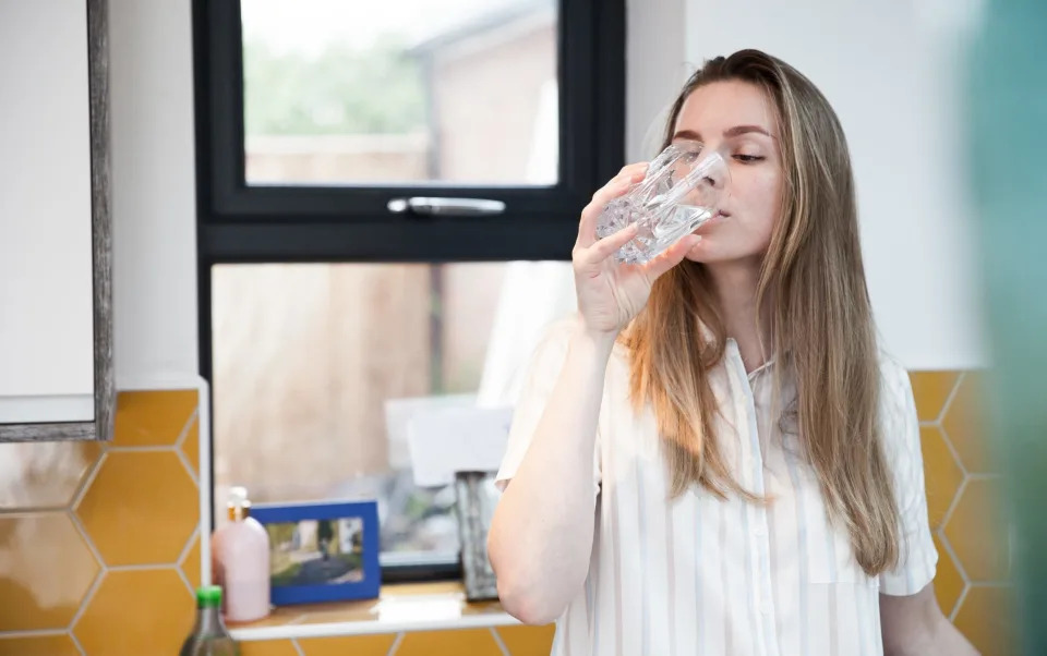 Girl drink glass of water