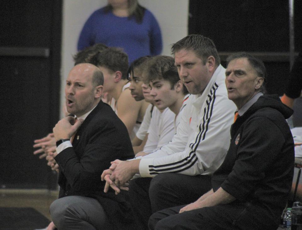 Cheboygan coaches and players look on during the first quarter of Wednesday's game against Rudyard.
