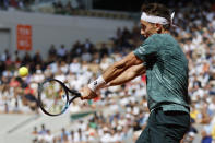 Norway's Casper Ruud backhands to Spain's Rafael Nadal during their final match of the French Open tennis tournament at the Roland Garros stadium Sunday, June 5, 2022 in Paris. (AP Photo/Jean-Francois Badias)