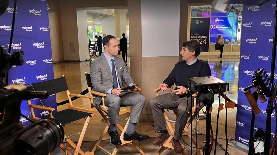 Apollo CEO Marc Rowan (right) speaks about markets and Mag 7 at the Milken conference with Yahoo Finance editor-in-chief Brian Sozzi (left).